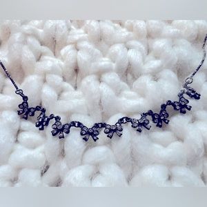 Vintage sterling silver necklace with rhinestone bows